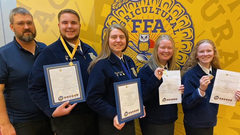 Plant and Animal Science students at FFA competition with awards.